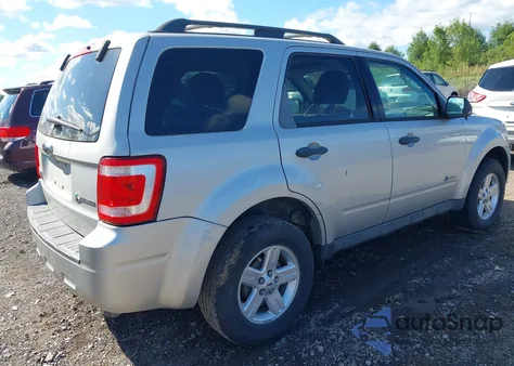 2009 Ford Escape Hybrid Limited z USA, uszkodzony, nr VIN 1FMCU49309KA49573